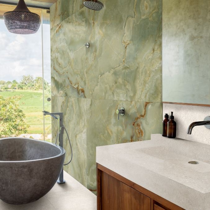 Modern bathroom with marble walls, a freestanding bathtub. 600x1200 Marazzi Onice Giada Satin Tiles. Melbourne, Geelong, Shepparton, Ballarat, Bendigo, Mornington, Bellarine, Peninsula tiles
