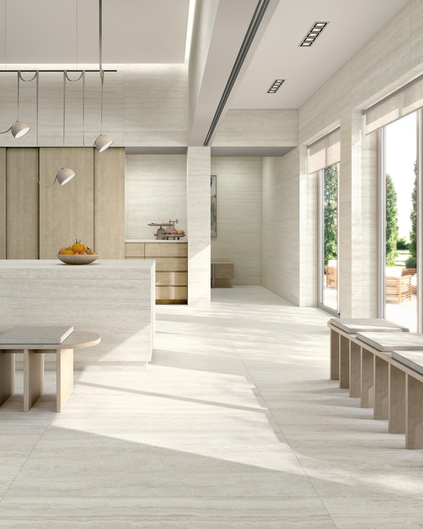 Modern kitchen with white countertops and wooden cabinets, large windows allowing natural light. Modern living with Parisian Collection travertine look tile walls and floors. Melbourne, Geelong, Shepparton, Ballarat, Bendigo, Mornington, Horsham, Lara, Sunbury, Melton, Bellarine, Peninsula, Warrnambool tiles. Victoria and Nationwide Delivery. Australia.