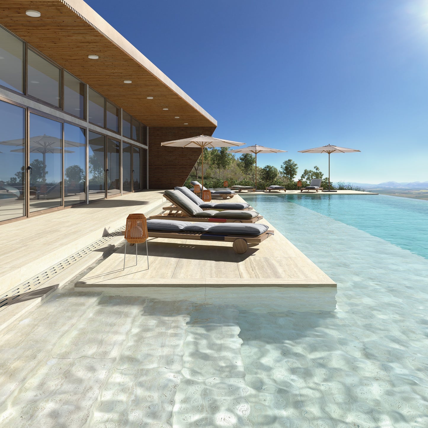 Modern poolside area with lounge chairs and umbrellas near a building with large glass windows. Modern bathroom and living with 600x1200 Travertine look tile walls and floors. Melbourne, Geelong, Shepparton, Ballarat, Bendigo, Mornington, Bellarine, Peninsula tiles. Victoria and Nationwide Delivery. Australia. Parisian. Vives. Attico. Comedor. Paris.