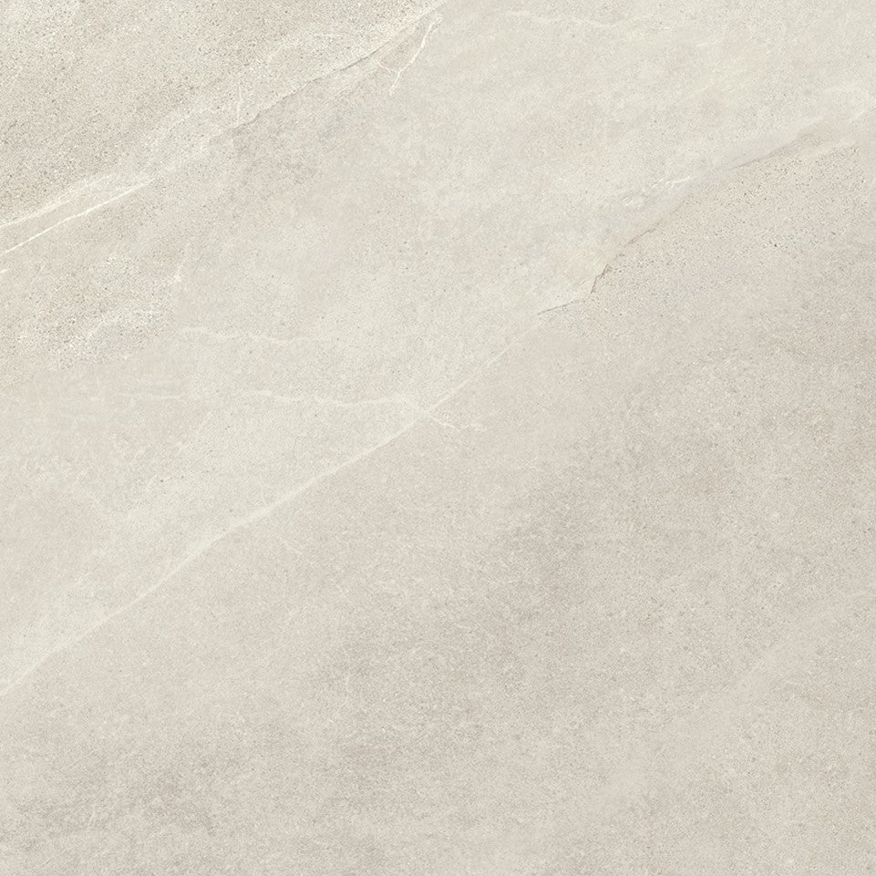 Close-up of a light gray ceramic tile with subtle texture. Modern bathroom and living with 600x600 Pietra Stone Look Matt Tiles. Melbourne, Geelong, Shepparton, Ballarat, Bendigo, Mornington, Bellarine, Peninsula, Melton, Lara, Sunbury, Warrnambool, Horsham tiles. Victoria and Nationwide Delivery. Australia.