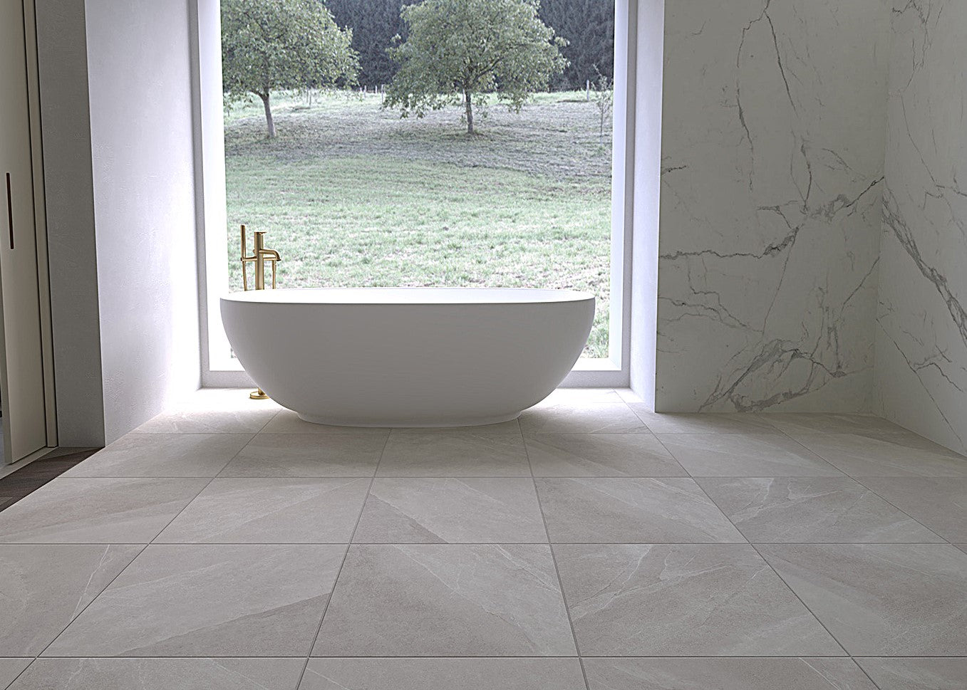 Modern bathroom with a freestanding bathtub near a large window with a view of greenery. Modern bathroom and living with 600x600 Pietra Stone Look Matt Tiles. Melbourne, Geelong, Shepparton, Ballarat, Bendigo, Mornington, Bellarine, Peninsula, Melton, Lara, Sunbury, Warrnambool, Horsham tiles. Victoria and Nationwide Delivery. Australia.