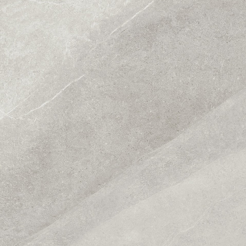 Close-up of gray stone tile with a subtle pattern. Modern bathroom and living with 600x600 Pietra Stone Look Matt Tiles. Melbourne, Geelong, Shepparton, Ballarat, Bendigo, Mornington, Bellarine, Peninsula, Melton, Lara, Sunbury, Warrnambool, Horsham tiles. Victoria and Nationwide Delivery. Australia.