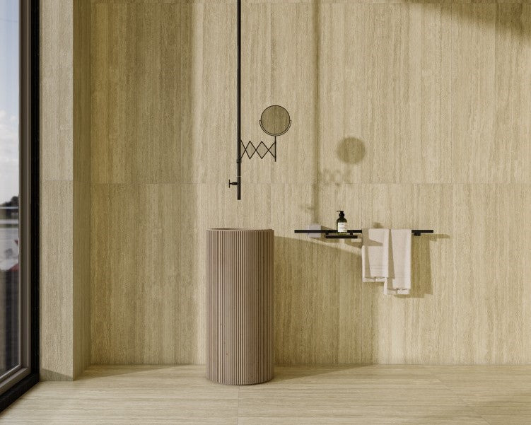 Bathroom corner with a cylindrical sink against a tiled wall. Modern bathroom and living with 600x1200 Travertine look tile walls and floors. Melbourne, Geelong, Shepparton, Ballarat, Bendigo, Mornington, Bellarine, Peninsula tiles. Victoria and Nationwide Delivery. Australia.