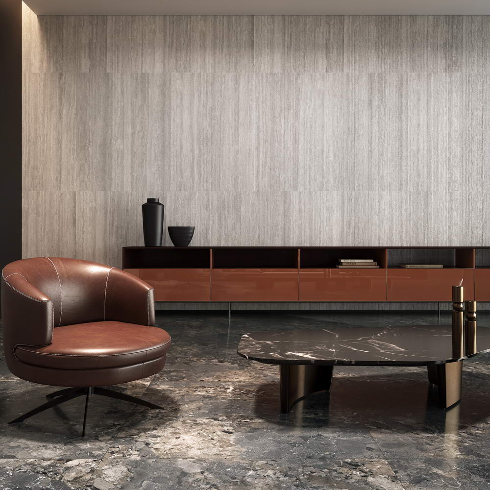 Modern interior with a brown leather chair and marble coffee table against a textured wall. Modern bathroom and living with 600x1200 Travertine look tile walls and floors. Melbourne, Geelong, Shepparton, Ballarat, Bendigo, Mornington, Bellarine, Peninsula tiles. Victoria and Nationwide Delivery. Australia.