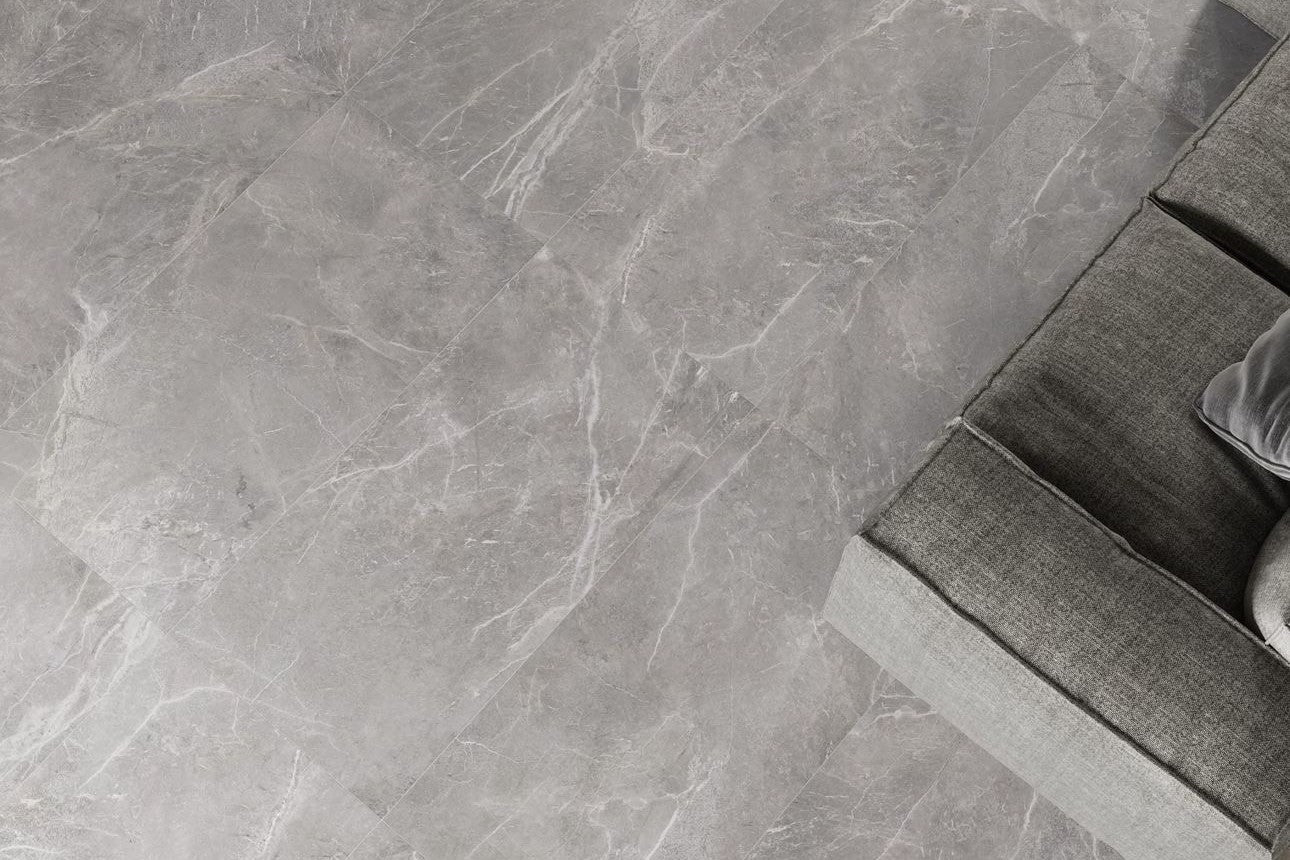 Close-up of gray marble-like tiles on a floor. Modern bathroom and living with 600x600 Palermo Marble Stone Look tile walls and floors. Melbourne, Geelong, Shepparton, Ballarat, Bendigo, Mornington, Bellarine, Peninsula tiles. Victoria and Nationwide Delivery. Australia.
